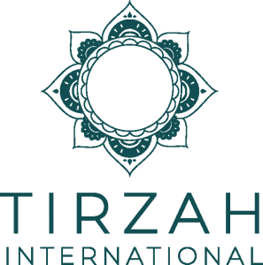 The Tirzah logo, a mandala sort of design in forest green.