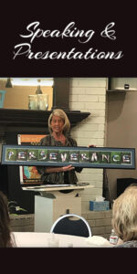 Speaking & Presentations - Anastasia Hansel presenting to a group of women. Clicking here will bring you the speaking and presentations page.