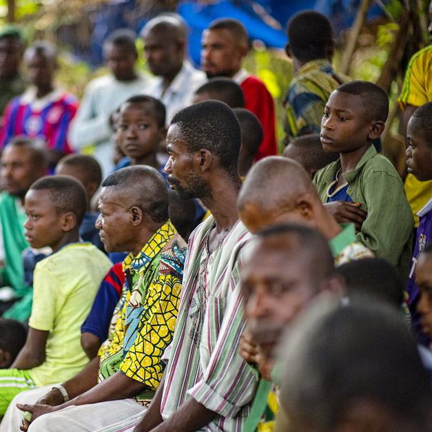 A group pf Congolese men attending a speaking engagement.