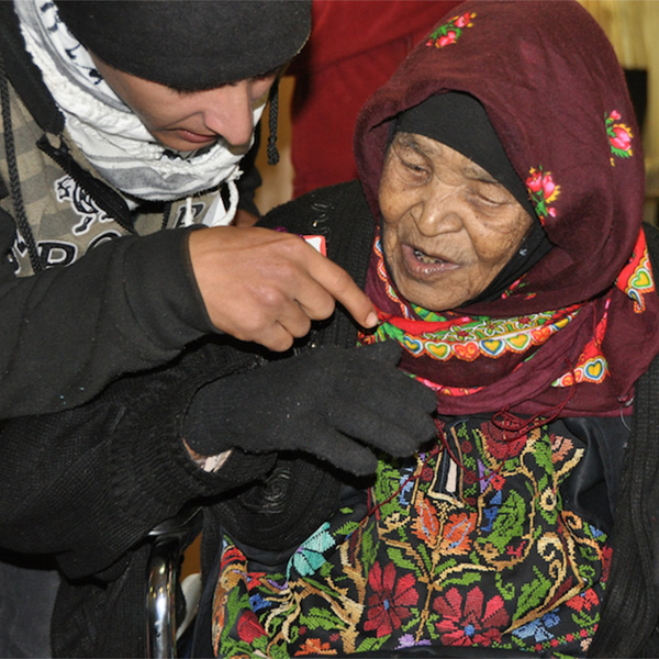 Close up of woman in wheelchair.