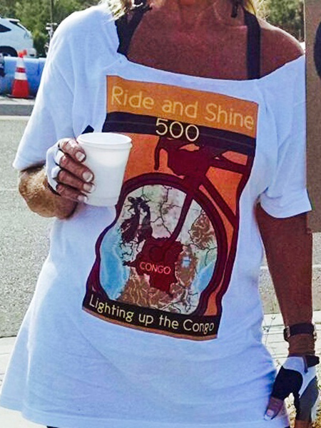 Closeup of Anastasia wearing the Ride and Shine 500 T-shirt